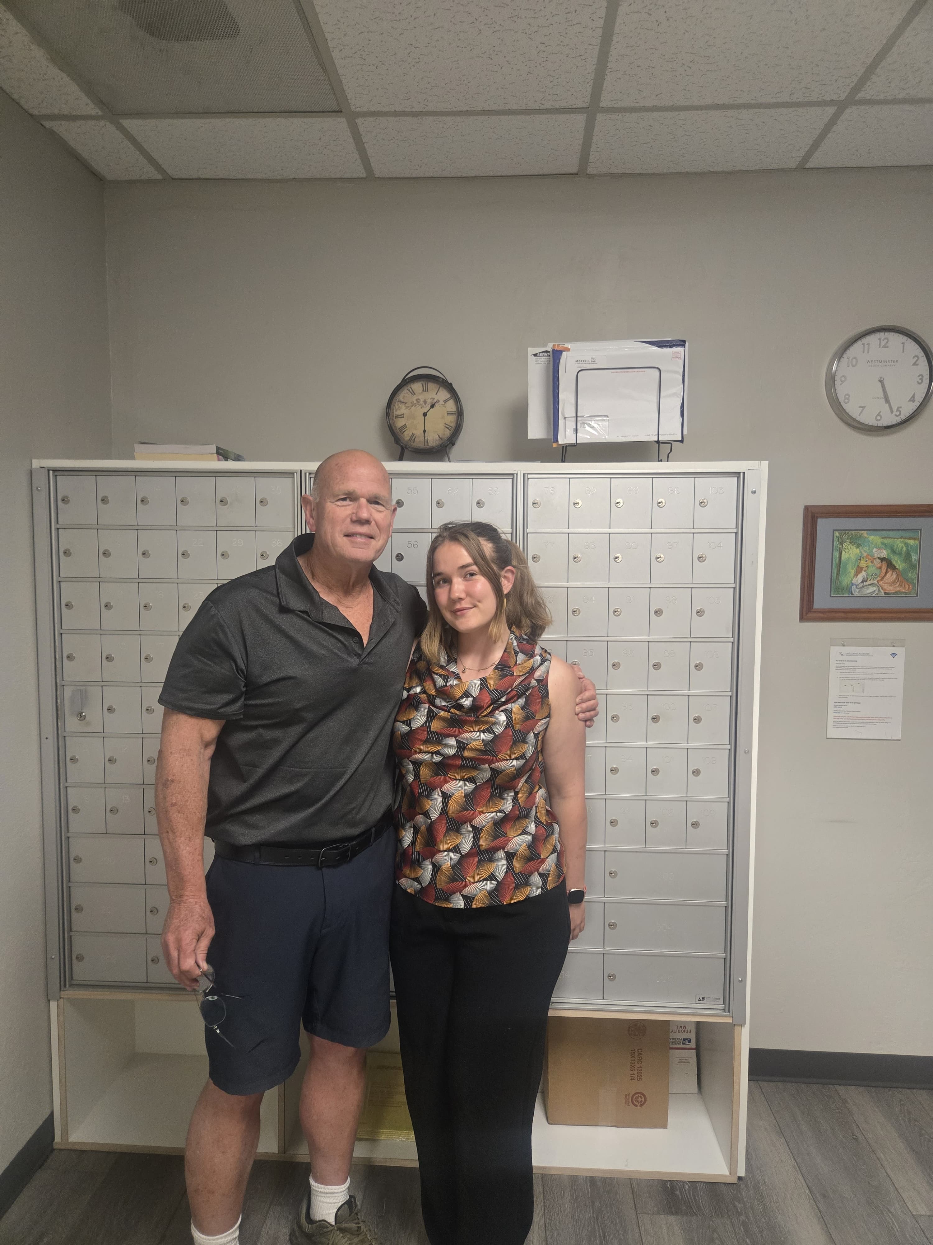 Lee, owner of East County Business Center, with his daughter Lei